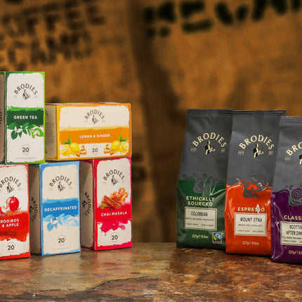 Cup of Scottish tea and freshly brewed coffee with biscuits