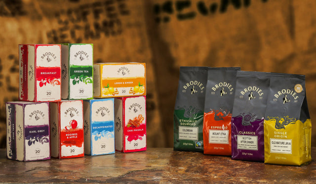 Cup of Scottish tea and freshly brewed coffee with biscuits