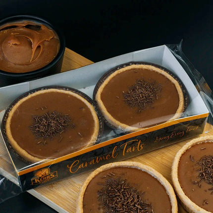 Chocolate tarts in a box with a dark background
